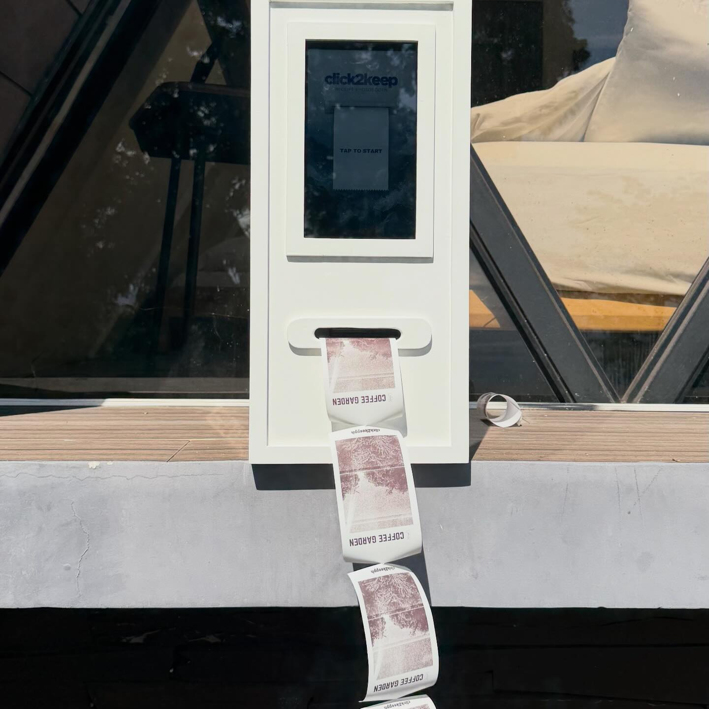 Photo strips printing out of a Click2Keep booth